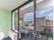 Balcony with sliding doors and partial ocean view at 1105 S Ocean Blvd. # 1040, Myrtle Beach, SC 29577