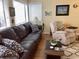 Relaxing living room with leather couch, recliner, and coffee table at 351 Lake Arrowhead Rd. # 20-179, Myrtle Beach, SC 29572