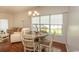Charming dining area with a round table and four chairs at 4917 Twin Pond Ct. # 102, Myrtle Beach, SC 29579