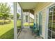 Relaxing screened porch with pond and community views at 4917 Twin Pond Ct. # 102, Myrtle Beach, SC 29579