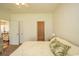 Spacious bedroom with king-size bed and access to bathroom at 4917 Twin Pond Ct. # 102, Myrtle Beach, SC 29579