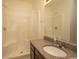 Bathroom with shower, granite countertop, and vanity at 4917 Twin Pond Ct. # 102, Myrtle Beach, SC 29579