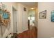 Bright entryway with hardwood floors and beach decor at 4917 Twin Pond Ct. # 102, Myrtle Beach, SC 29579