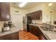 Kitchen with stainless steel appliances and granite countertops at 4917 Twin Pond Ct. # 102, Myrtle Beach, SC 29579