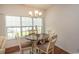 Bright dining area featuring a small round table and four chairs at 4917 Twin Pond Ct. # 102, Myrtle Beach, SC 29579