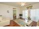 Living room with hardwood floors, comfortable seating, and access to patio at 4917 Twin Pond Ct. # 102, Myrtle Beach, SC 29579