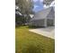 Gray house exterior with metal roof and attached garage at 410 40Th Ave. N, Myrtle Beach, SC 29577