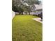 Spacious backyard with lush grass and white fence at 410 40Th Ave. N, Myrtle Beach, SC 29577