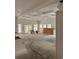Spacious living room with high ceilings and large windows, currently under construction at 410 40Th Ave. N, Myrtle Beach, SC 29577