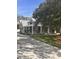 Single-Gathering home with metal roof, front porch and mature landscaping at 410 40Th Ave. N, Myrtle Beach, SC 29577