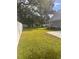 Spacious backyard with grassy lawn and white fence at 410 40Th Ave. N, Myrtle Beach, SC 29577