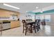 Bright kitchen with wood cabinets, granite countertops, and stainless steel appliances at 3401 N Ocean Blvd. # 306, North Myrtle Beach, SC 29582