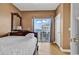 Bedroom with a queen-size bed and ocean views from its balcony at 3401 N Ocean Blvd. # 306, North Myrtle Beach, SC 29582
