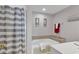 Bathroom with a large tub and shower, perfect for relaxing at 3401 N Ocean Blvd. # 306, North Myrtle Beach, SC 29582