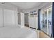 Main bedroom with queen bed, dresser, and access to balcony at 3401 N Ocean Blvd. # 306, North Myrtle Beach, SC 29582