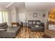 Vaulted ceiling living room with hardwood floors and comfy furniture at 1206 Benna Dr. # 4-F, Myrtle Beach, SC 29577