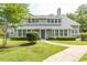 Two-story home with gray siding and landscaped yard at 1206 Benna Dr. # 4-F, Myrtle Beach, SC 29577