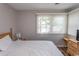 Bright bedroom with a double bed, window, and dresser at 1206 Benna Dr. # 4-F, Myrtle Beach, SC 29577