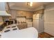 Well-equipped kitchen with light-colored cabinets and appliances at 1206 Benna Dr. # 4-F, Myrtle Beach, SC 29577