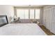 Bright bedroom offering a cozy sitting area and built-in closet at 1206 Benna Dr. # 4-F, Myrtle Beach, SC 29577