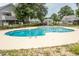 Community pool with surrounding landscaping at 1206 Benna Dr. # 4-F, Myrtle Beach, SC 29577