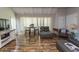 Open living space with hardwood floors, seating, and dining area at 1206 Benna Dr. # 4-F, Myrtle Beach, SC 29577