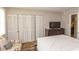 Well-lit bedroom featuring a large closet and access to a hallway at 1206 Benna Dr. # 4-F, Myrtle Beach, SC 29577