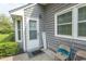 Exterior view showing the back door and patio area at 1206 Benna Dr. # 4-F, Myrtle Beach, SC 29577