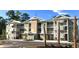 Exterior view of a three story building at 144 Puffin Dr. # 2-E, Pawleys Island, SC 29585