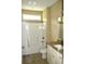 Clean bathroom with shower/tub combo, granite vanity, and tiled floor at 144 Puffin Dr. # 2-E, Pawleys Island, SC 29585