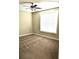 Bright bedroom featuring carpet flooring and a large window with blinds at 144 Puffin Dr. # 2-E, Pawleys Island, SC 29585