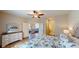 Main bedroom with views of living room and access to ensuite bathroom at 144 Puffin Dr. # 2-E, Pawleys Island, SC 29585
