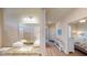 Well-appointed bathroom with granite countertop, updated vanity, and shower at 144 Puffin Dr. # 2-E, Pawleys Island, SC 29585