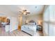 Comfortable bedroom with queen bed, nightstands and ceiling fan at 144 Puffin Dr. # 2-E, Pawleys Island, SC 29585