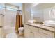 Clean bathroom with granite countertops, tub, and shower at 144 Puffin Dr. # 2-E, Pawleys Island, SC 29585