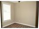 Small bedroom with neutral walls, carpet, and window with blinds at 144 Puffin Dr. # 2-E, Pawleys Island, SC 29585