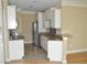 Modern kitchen with granite countertops and stainless steel appliances at 144 Puffin Dr. # 2-E, Pawleys Island, SC 29585