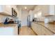 Modern kitchen with granite countertops and stainless steel appliances at 144 Puffin Dr. # 2-E, Pawleys Island, SC 29585