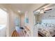 Bright hallway with wood floors and access to bedrooms and living areas at 144 Puffin Dr. # 2-E, Pawleys Island, SC 29585
