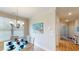 Charming dining area with a table for four and hardwood floors at 144 Puffin Dr. # 2-E, Pawleys Island, SC 29585