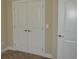 Spacious closet with double doors and neutral walls at 144 Puffin Dr. # 2-E, Pawleys Island, SC 29585