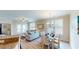 Spacious living area with access to a balcony at 144 Puffin Dr. # 2-E, Pawleys Island, SC 29585