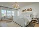 Bright bedroom with large windows and a cozy sitting area at Tbd Jazz Ct. # Tbd, Myrtle Beach, SC 29572