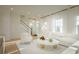 Bright and airy living room with white sofa and large windows at Tbd Jazz Ct. # Tbd, Myrtle Beach, SC 29572