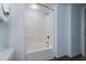 Bathroom with tub and shower combination, and a clean, white interior at 1321 S Ocean Blvd. # 606, North Myrtle Beach, SC 29582