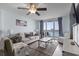 Ocean view living room with comfy seating and large TV at 1321 S Ocean Blvd. # 606, North Myrtle Beach, SC 29582