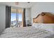 King-size bed in a bedroom with ocean view at 1321 S Ocean Blvd. # 606, North Myrtle Beach, SC 29582