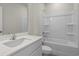 Clean bathroom with a white tub/shower combo, and a vanity with a quartz countertop at 3058 Deerberry Place, Longs, SC 29568