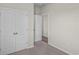 Bedroom with double door closet and access to another room at 3058 Deerberry Place, Longs, SC 29568