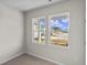 Bright bedroom with large windows, neutral walls, and carpeting at 3058 Deerberry Place, Longs, SC 29568